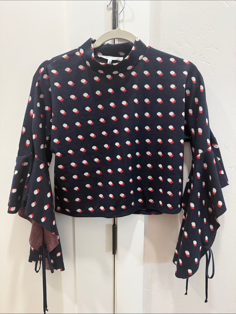BCBGeneration Navy Polka Dot Bell Sleeve Crop Top